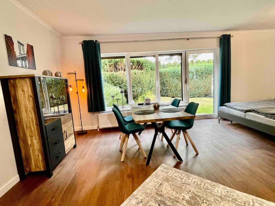 Studioappartement Mit Privatgarten In Ruhiger Wohnsiedlung 노이뮌스터 외부 사진