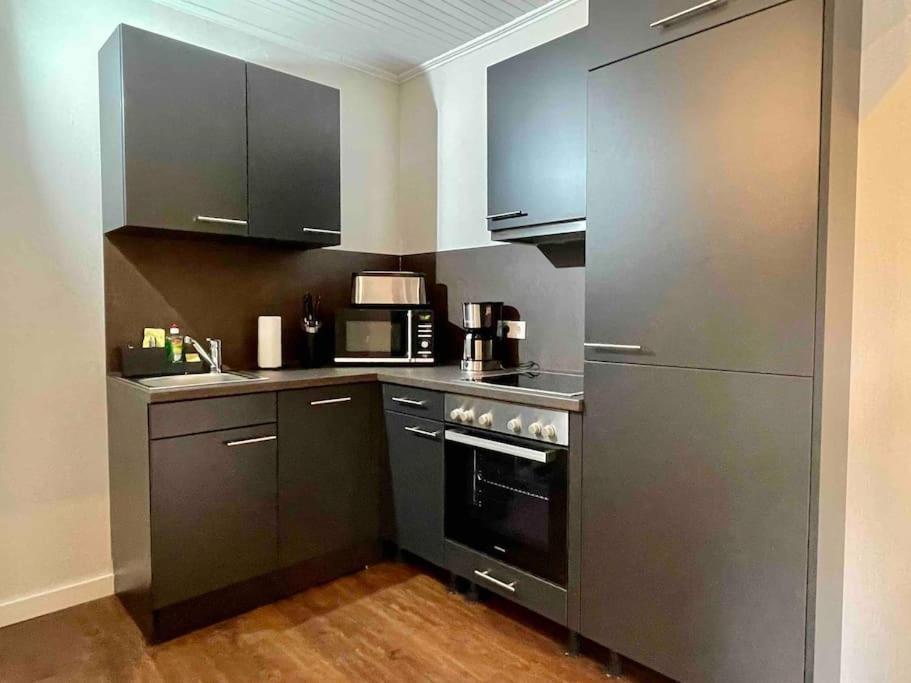 Studioappartement Mit Privatgarten In Ruhiger Wohnsiedlung 노이뮌스터 외부 사진